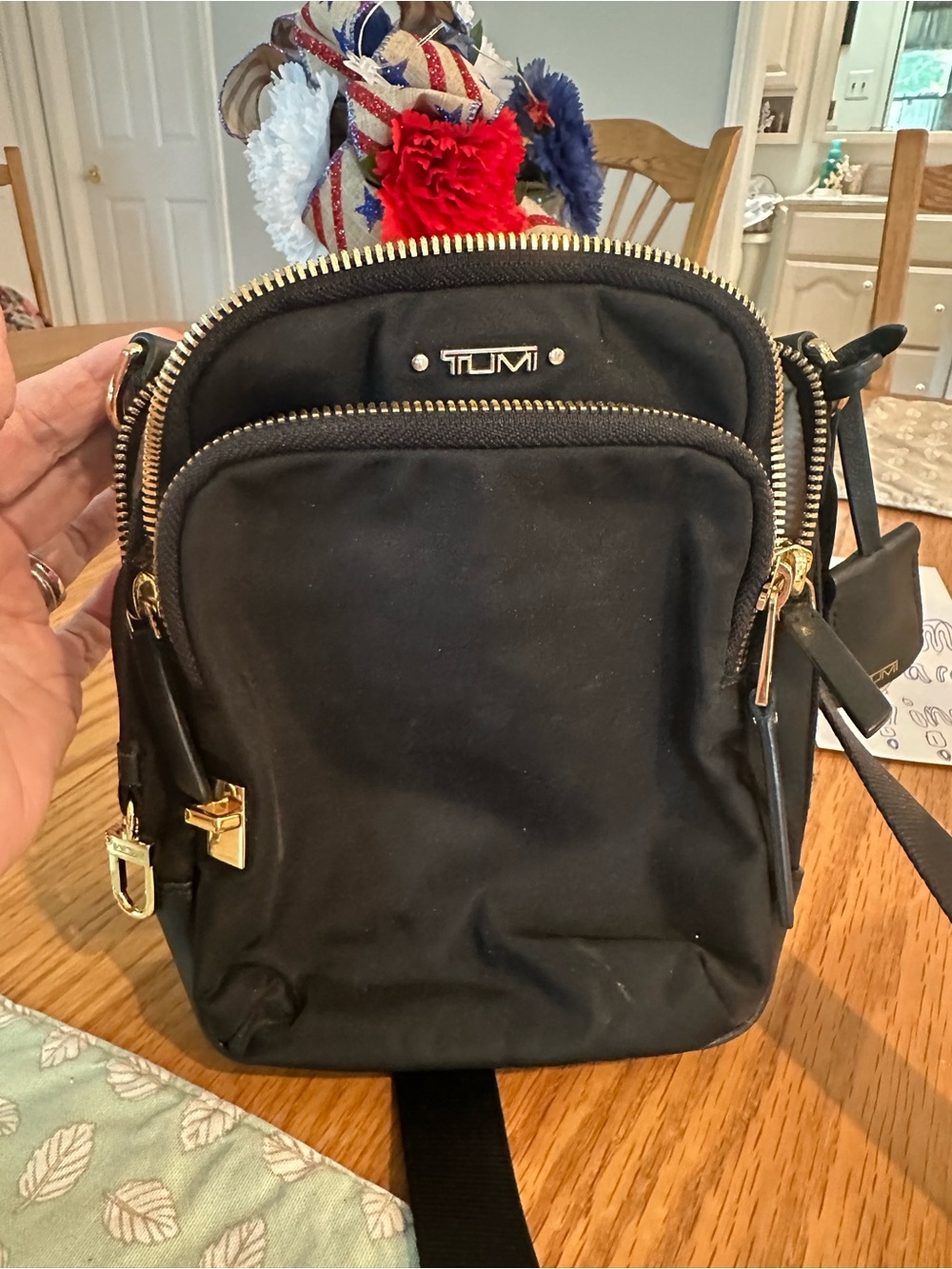 Tumi Black Crossbody Messenger Bag with Gold Hardware